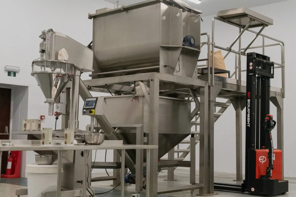 The stainless steel blending and filling line on the Rawcreation production floor